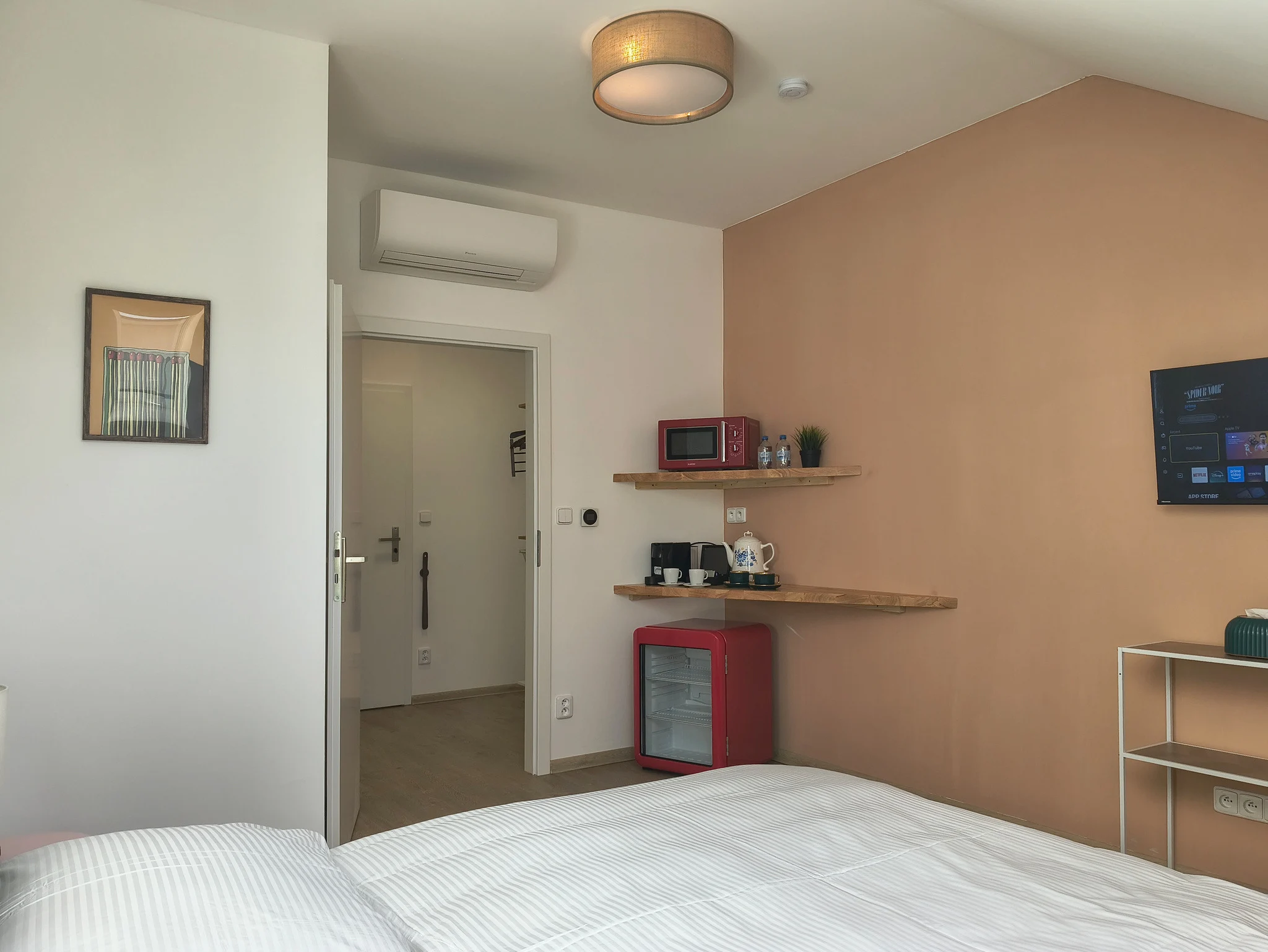 Interior or bathroom photograph of room 403 at CHILL Apartments
