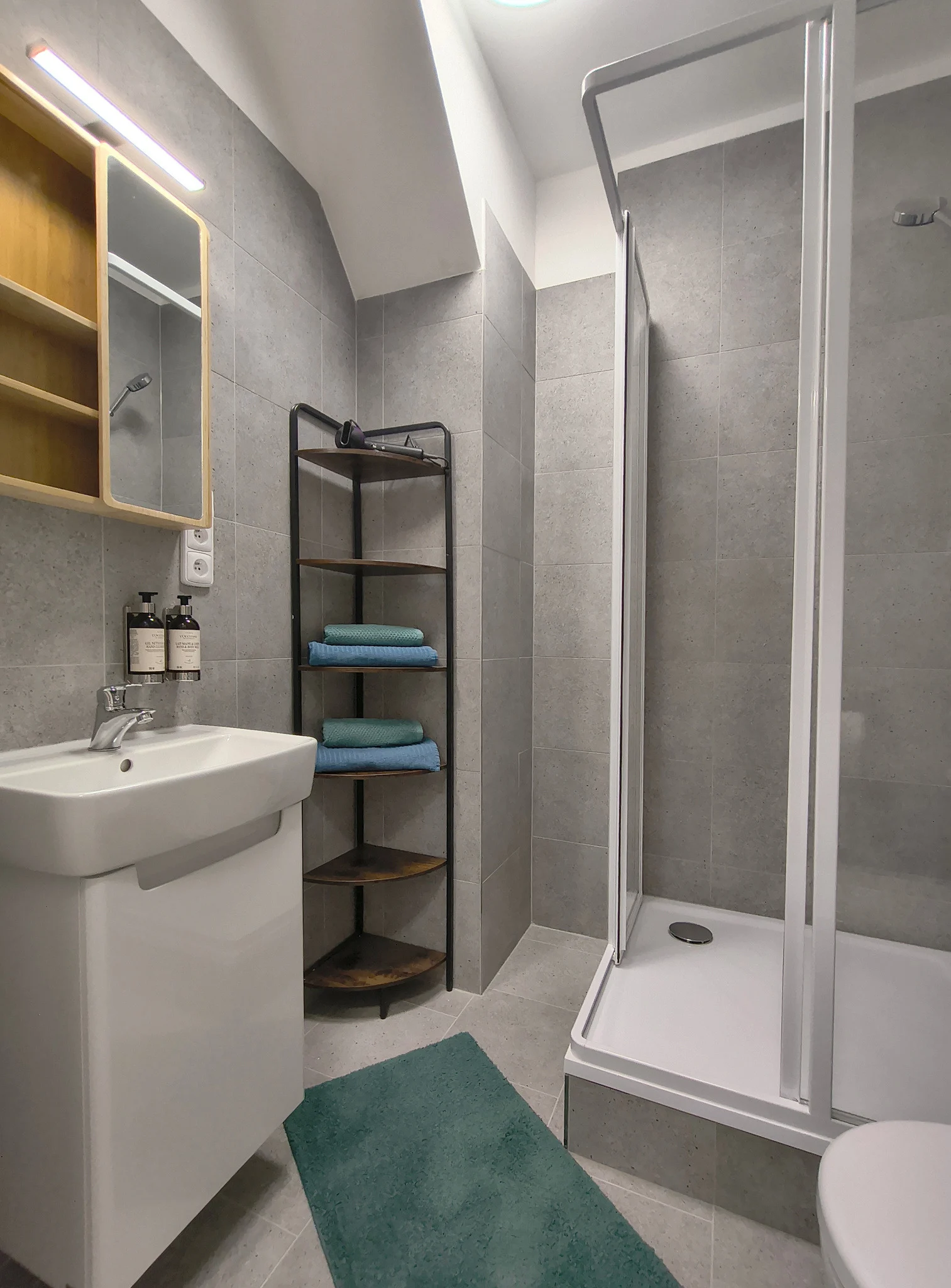 Interior or bathroom photograph of room 405 at CHILL Apartments