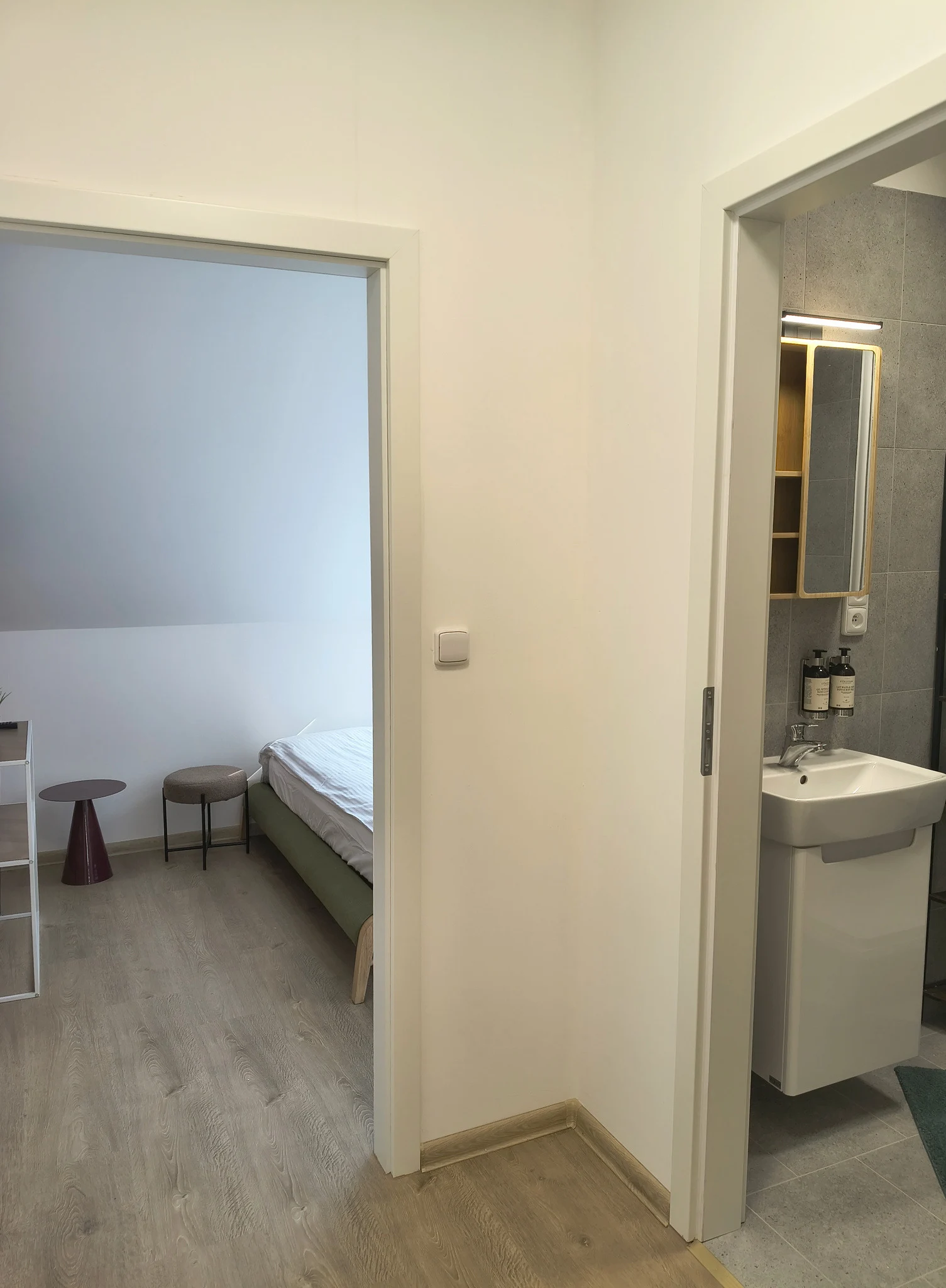 Interior or bathroom photograph of room 405 at CHILL Apartments