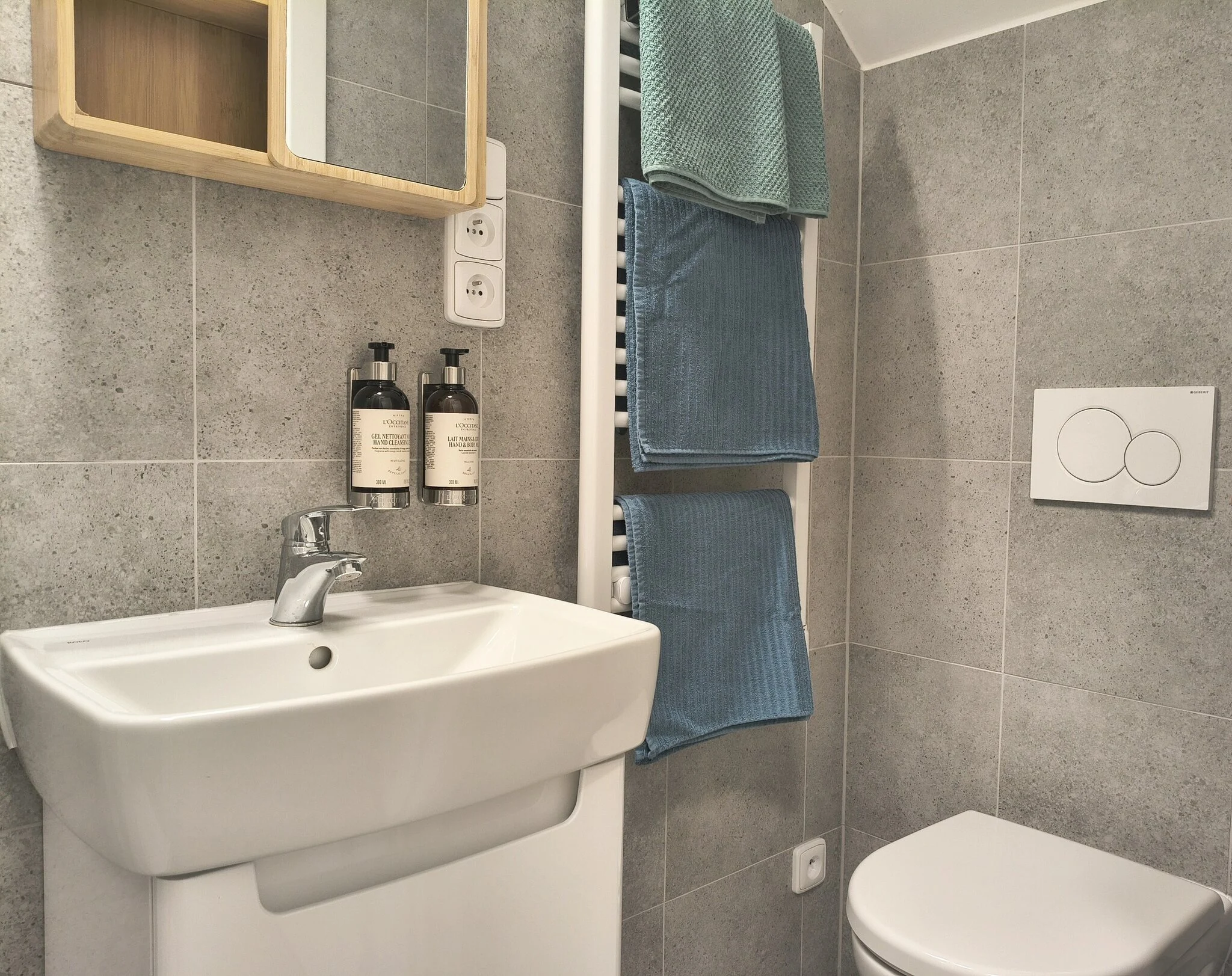 Interior or bathroom photograph of room 410 at CHILL Apartments